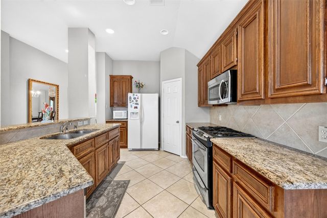 9403 Comstock Meadows Drive, Houston, TX 77095