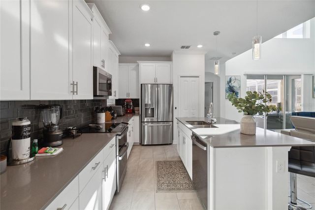 1009 LEADER, Davenport, FL 33896