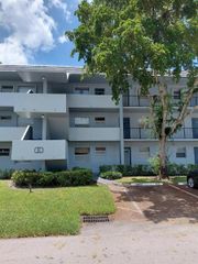 8350 SANDS POINT Boulevard 102E, Tamarac, FL 33321
