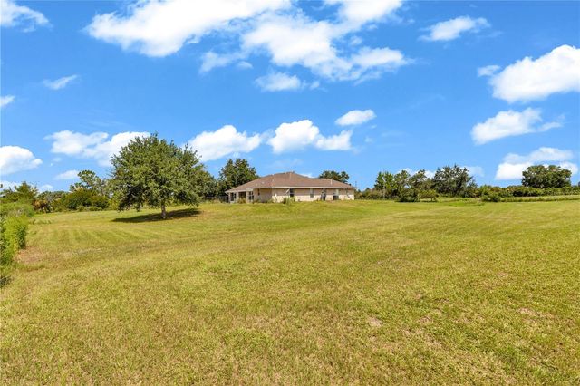 1005 WHISPRING CREEK WAY, Osteen, FL 32764