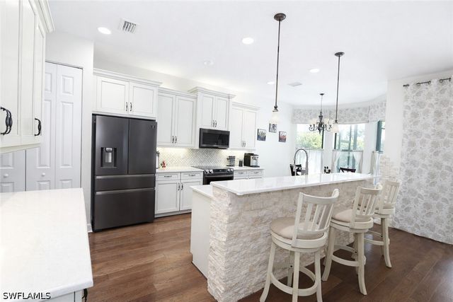 13728 Luna DR, Naples, FL 34109