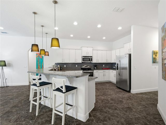 695 GRAPE IVY LANE, New Smyrna Beach, FL 32168