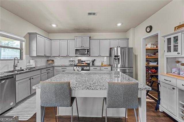 489 Azalea Bloom Drive, Loganville, GA 30052