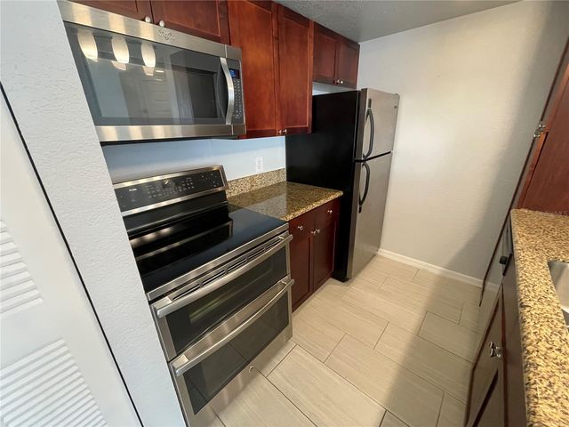 5128 CONROY ROAD 13, Orlando, FL 32811