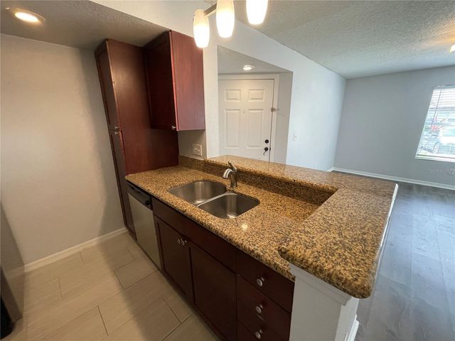5128 CONROY ROAD 13, Orlando, FL 32811