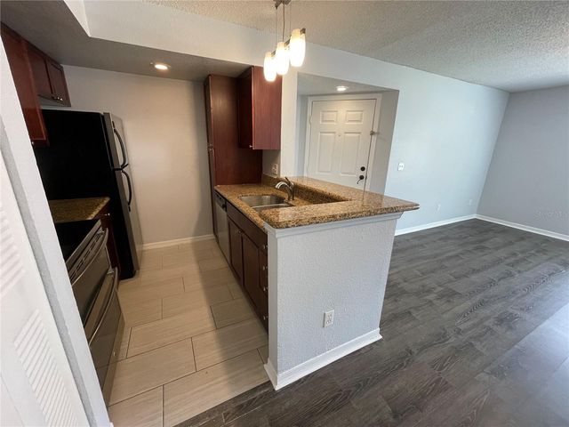 5128 CONROY ROAD 13, Orlando, FL 32811