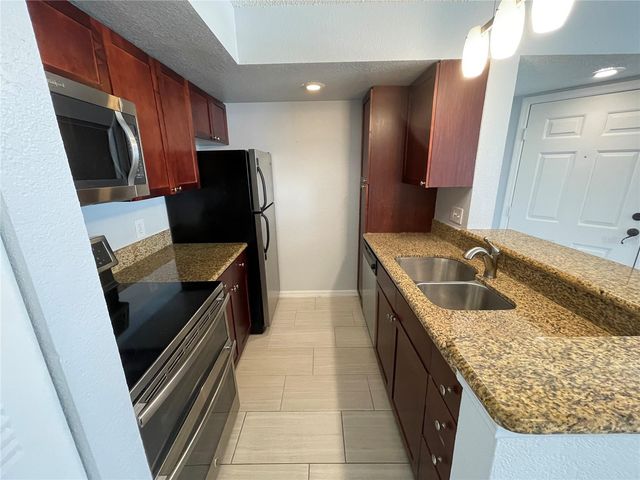 5128 CONROY ROAD 13, Orlando, FL 32811