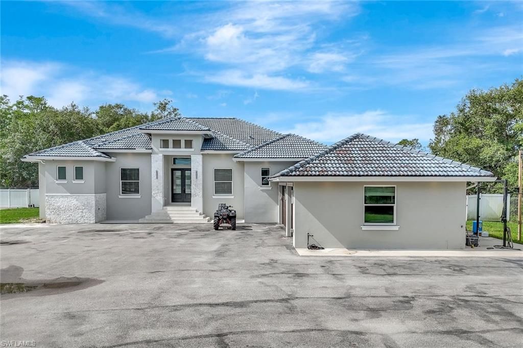 140 37th AVE NW, NAPLES, FL 34120 — photo 5