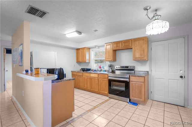 77 Regina Boulevard, Beverly Hills, FL 34465