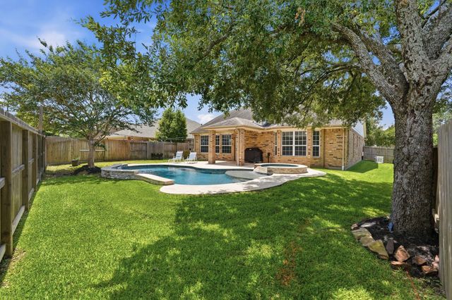 12322 Scherer Woods Court, Tomball, TX 77377