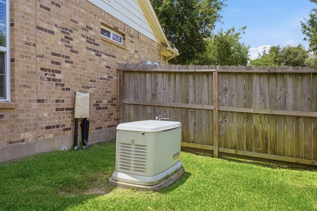 12322 Scherer Woods Court, Tomball, TX 77377