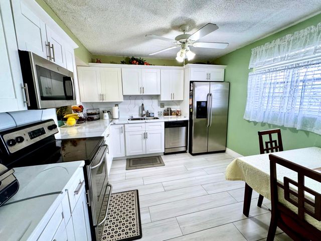 4930 E Sabal Palm Boulevard 107, Tamarac, FL 33319