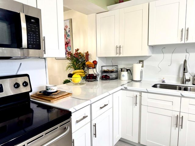 4930 E Sabal Palm Boulevard 107, Tamarac, FL 33319