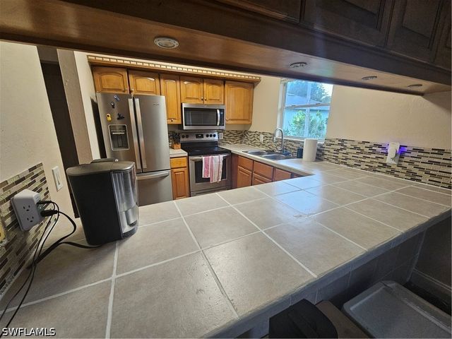 2430 Golden Gate BLVD E, Naples, FL 34120