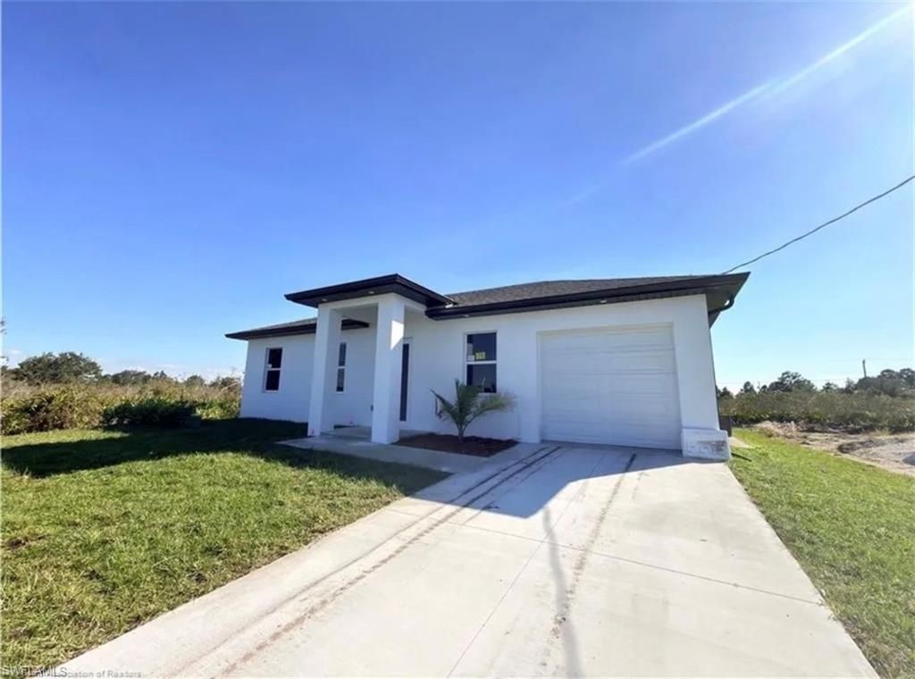 2803 68th ST W, LEHIGH ACRES, FL 33971 — photo 2