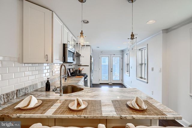 228 S WASHINGTON ST, Baltimore, MD 21231