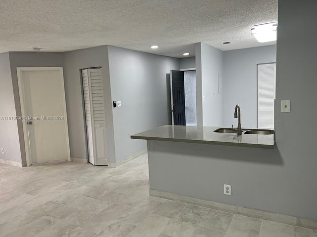 11205 W Atlantic Blvd 203, Coral Springs, FL 33071