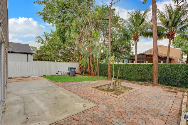 1413 Blue Clover Lane, West Palm Beach, FL 33415