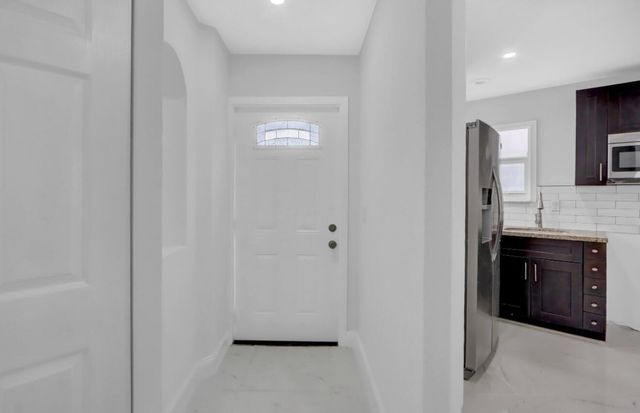 1413 Blue Clover Lane, West Palm Beach, FL 33415