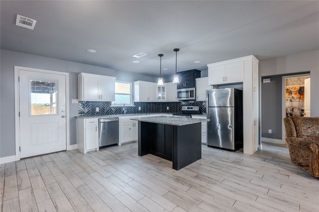 945 Erwin Road, Poolville, TX 76487