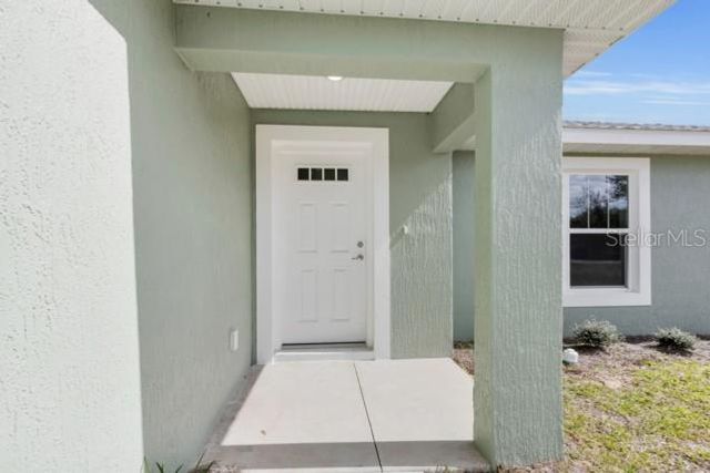 25 LOCUST LOOP LANE, Ocala, FL 34472