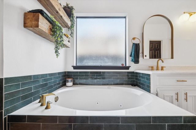 5806 Woodland Falls Drive, Kingwood, TX 77345