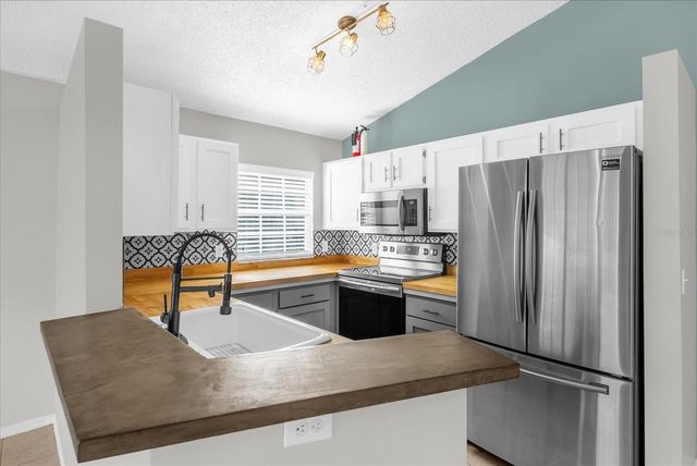 1456 BROOKEBRIDGE DRIVE, Orlando, FL 32825