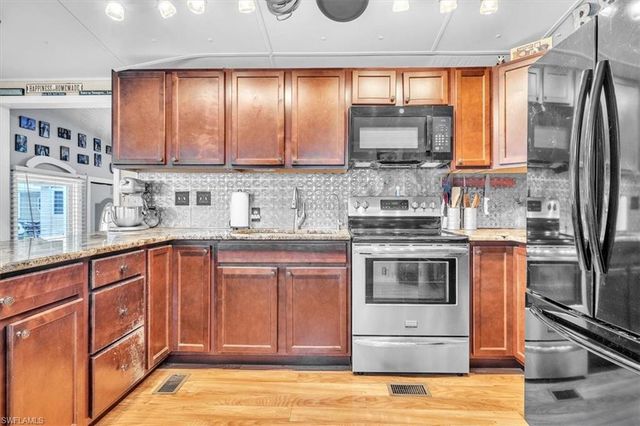 10933 Brown Pelican CIR, Estero, FL 33928