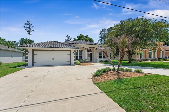 142 ERIC DRIVE, Palm Coast, FL 32164