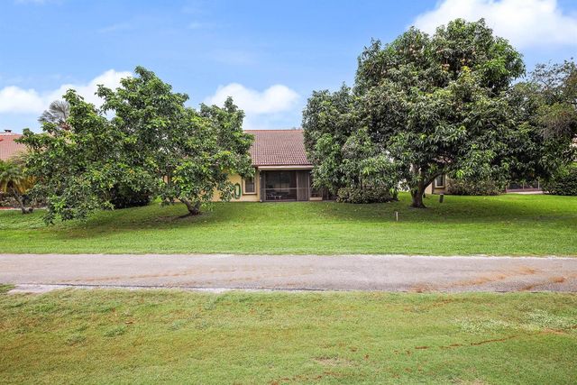 7003 GOLF POINTE Circle, Tamarac, FL 33321