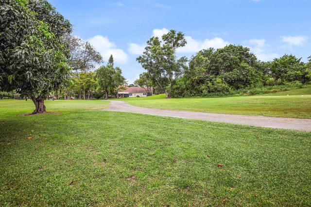 7003 GOLF POINTE Circle, Tamarac, FL 33321