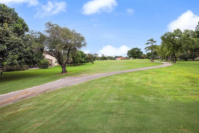 7003 GOLF POINTE Circle, Tamarac, FL 33321