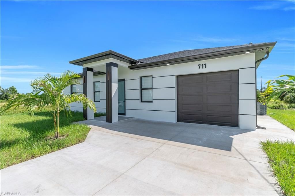 711 Roma AVE S, Lehigh Acres, FL 33974
