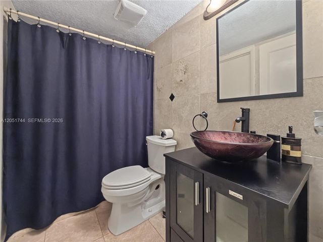 9720 E Calusa Club Dr, Miami, FL 33186