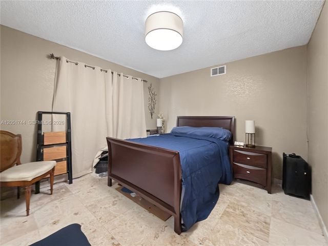 9720 E Calusa Club Dr, Miami, FL 33186