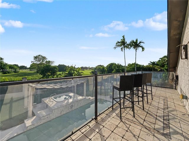 9720 E Calusa Club Dr, Miami, FL 33186