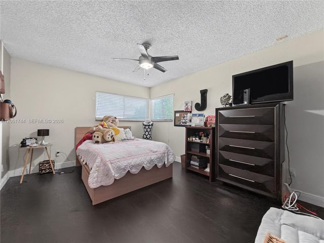 9720 E Calusa Club Dr, Miami, FL 33186