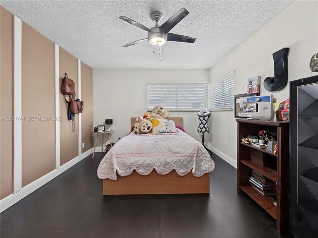 9720 E Calusa Club Dr, Miami, FL 33186