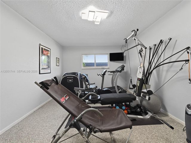 9720 E Calusa Club Dr, Miami, FL 33186