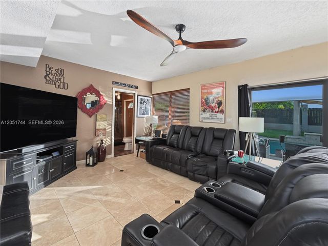 9720 E Calusa Club Dr, Miami, FL 33186