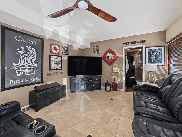 9720 E Calusa Club Dr, Miami, FL 33186