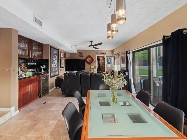 9720 E Calusa Club Dr, Miami, FL 33186