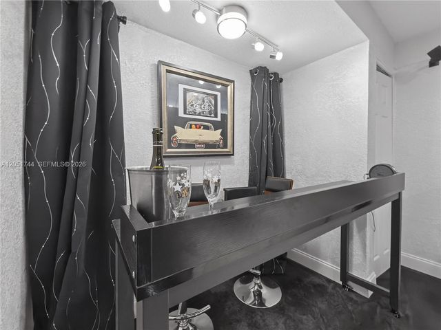 9720 E Calusa Club Dr, Miami, FL 33186