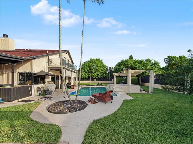 9720 E Calusa Club Dr, Miami, FL 33186