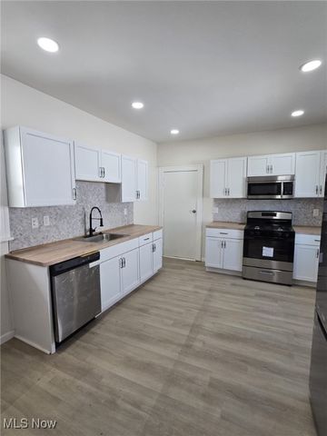 1234 E 61st Street, Cleveland, OH 44103