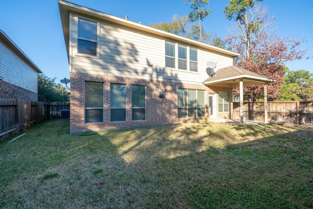 138 Magnolia Grove Lane, Conroe, TX 77384