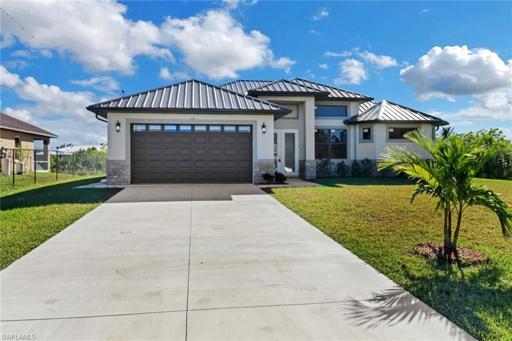 3303 16th ST W, LEHIGH ACRES, FL 33971 — photo 2