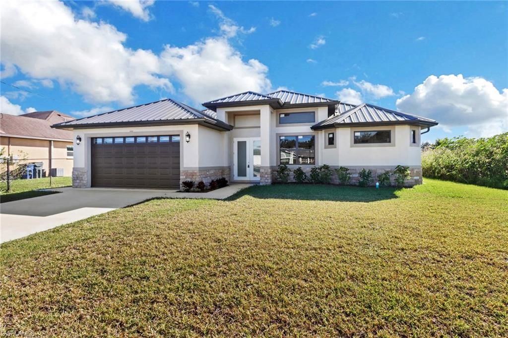 3303 16th ST W, LEHIGH ACRES, FL 33971 — photo 3