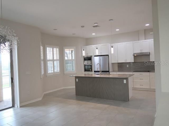 13183 WOODFORD STREET, Orlando, FL 32832