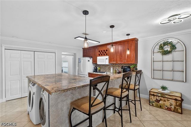 1129 Joel BLVD, Lehigh Acres, FL 33936